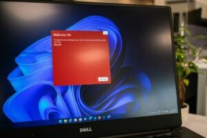 Laptop showing a warning screen representing malware blocked by NordVPN Threat Protection