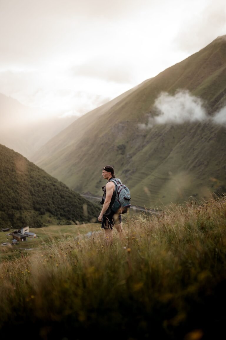 Hiker with backpack in misty mountain landscape representing Berghaus GB Review 2026